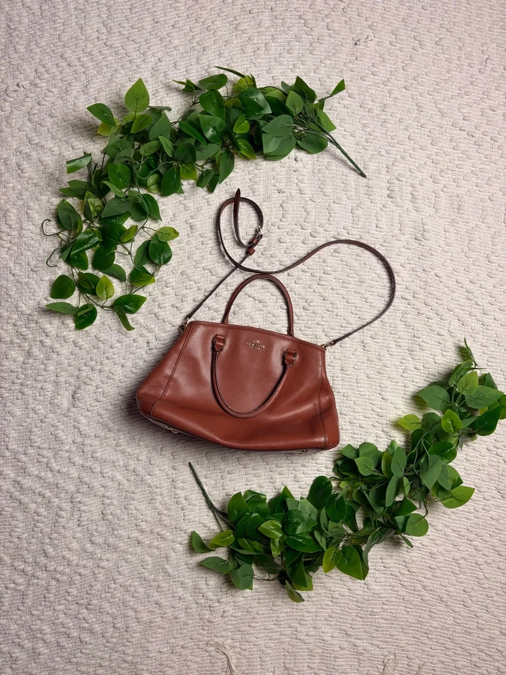 Brown Coach leather and gold-tone hardware RETAIL PRICE IS $395